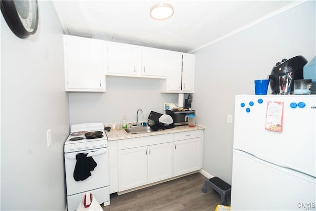 kitchen featuring ornamental molding, white appliances, sink, dark hardwood / wood-style floors, and white cabinetry