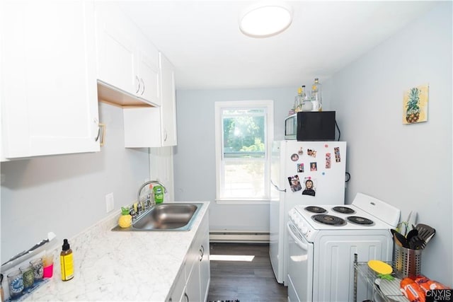 kitchen featuring white appliances, dark wood-type flooring, white cabinets, sink, and a baseboard radiator