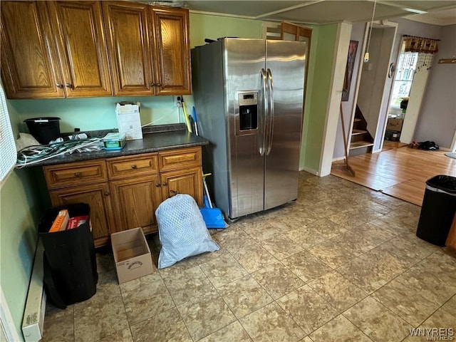 kitchen with stainless steel fridge with ice dispenser