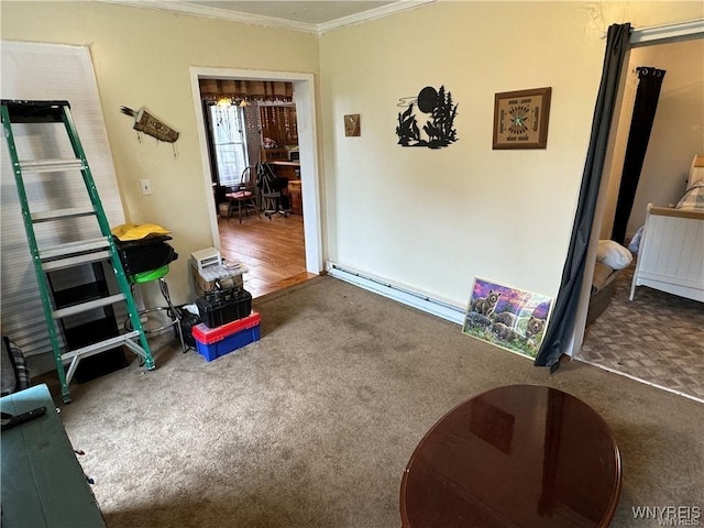 interior space featuring baseboard heating, crown molding, and carpet