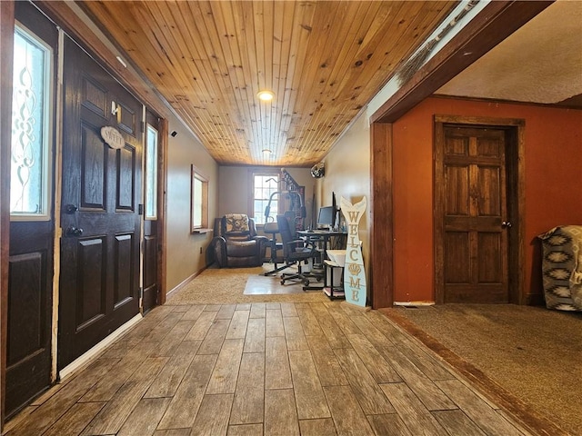 unfurnished office featuring wooden ceiling