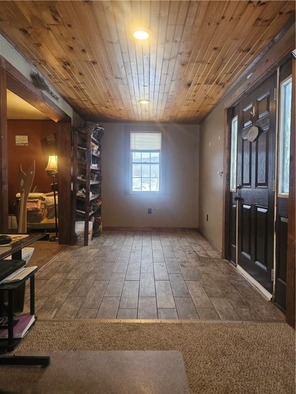 foyer featuring wood ceiling