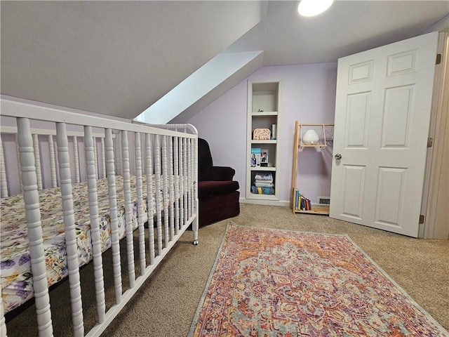 bedroom featuring carpet flooring and vaulted ceiling