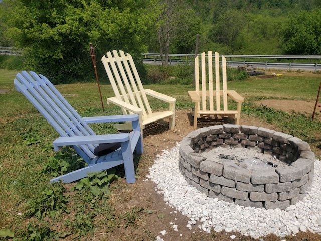 view of patio / terrace featuring a fire pit