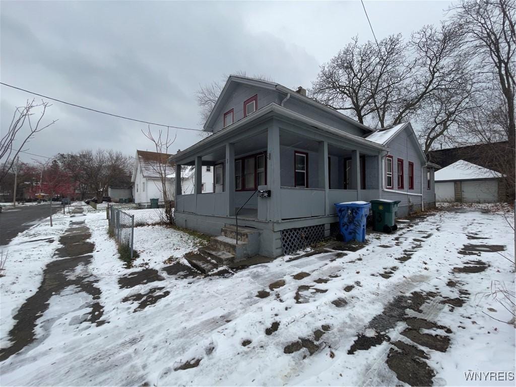 view of snow covered property