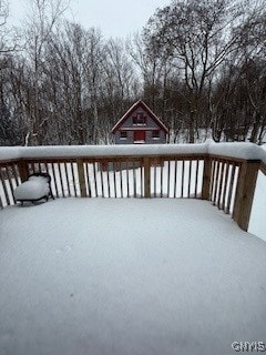 view of snow covered deck