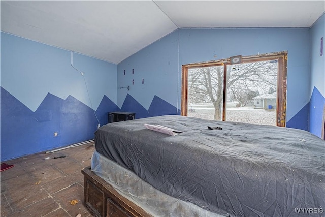 bedroom with vaulted ceiling