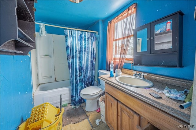 full bathroom with toilet, vanity, and shower / tub combo with curtain