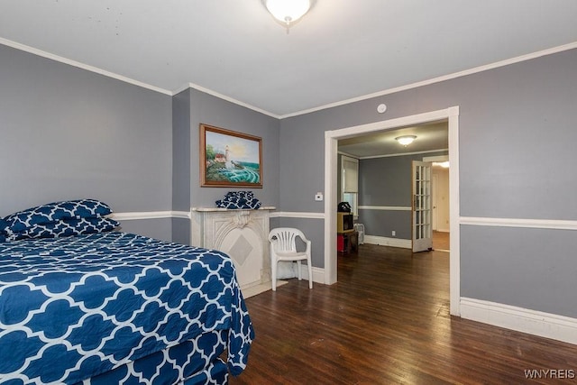 bedroom featuring dark hardwood / wood-style floors and crown molding