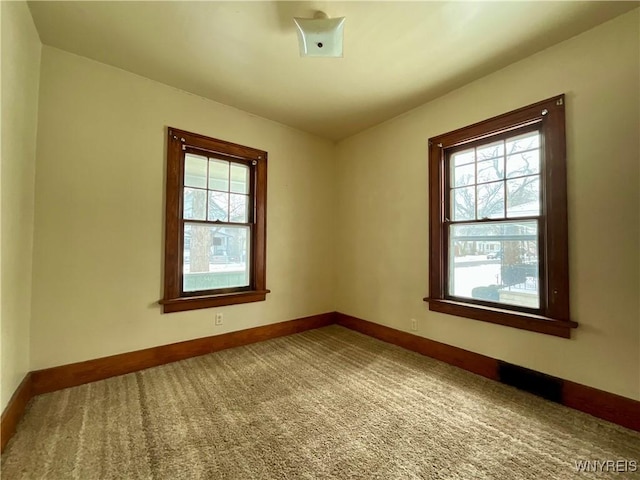 view of carpeted spare room