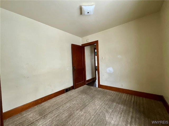 view of carpeted spare room