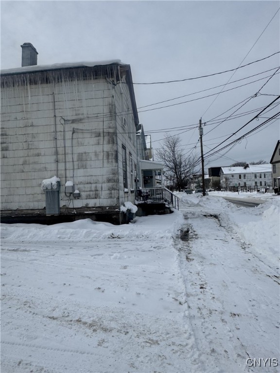 view of snow covered property