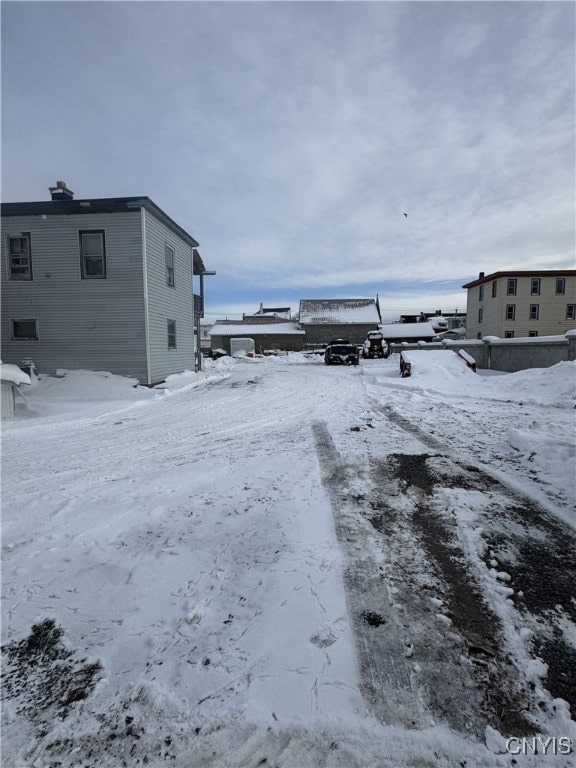 view of yard covered in snow