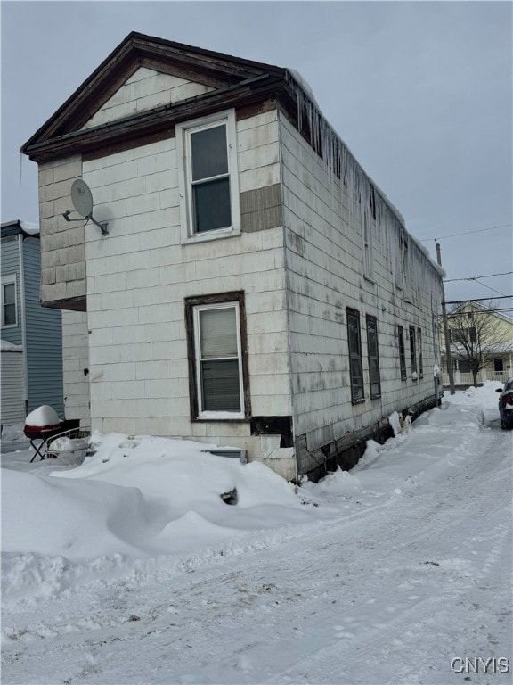 view of snow covered property