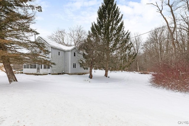 view of yard covered in snow