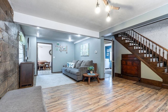 living room with light hardwood / wood-style flooring