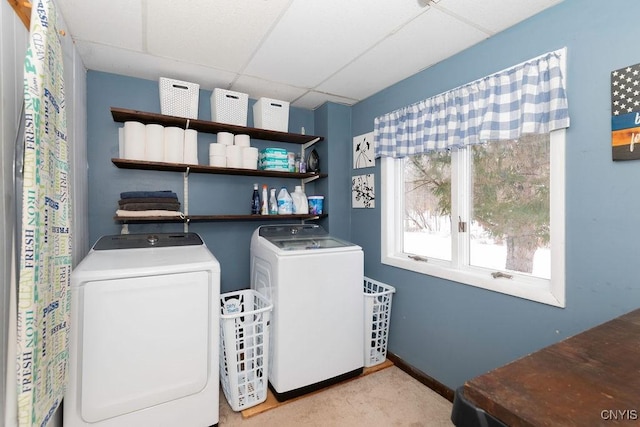 laundry area featuring light colored carpet and independent washer and dryer