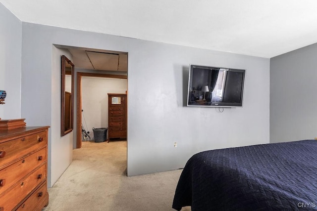 bedroom with light colored carpet