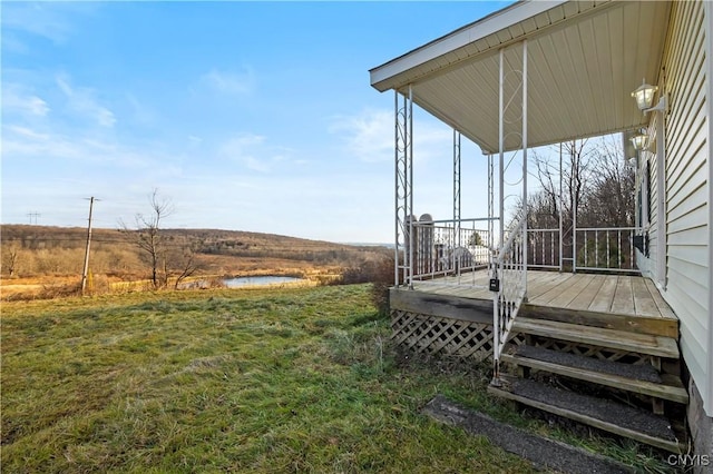 view of yard featuring a wooden deck