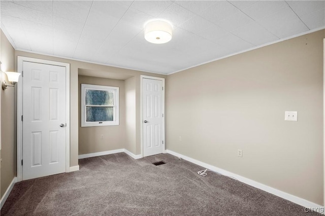 unfurnished bedroom with carpet flooring