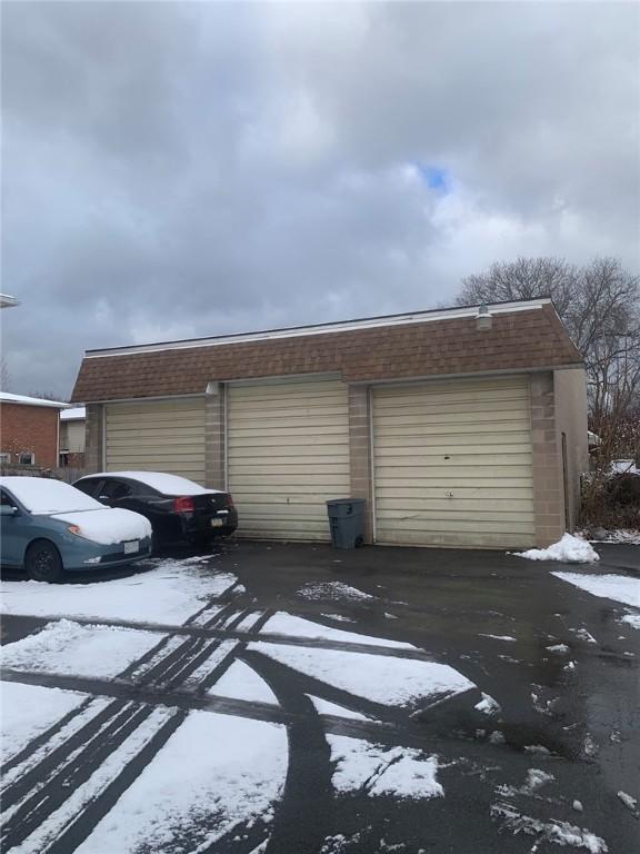 view of snow covered garage