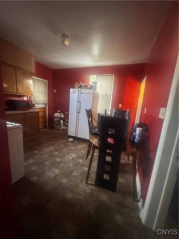 748 Jay St, Utica, NY 13501 - dining room with dark floors