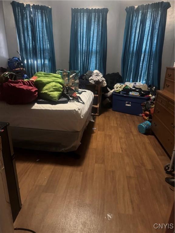 748 Jay St, Utica, NY 13501 - bedroom with wood finished floors