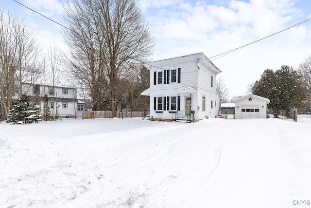 view of front of home featuring an outbuilding and a garage