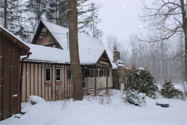 view of snow covered property