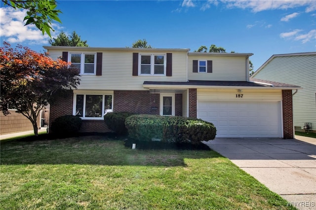 front facade with a front yard and a garage