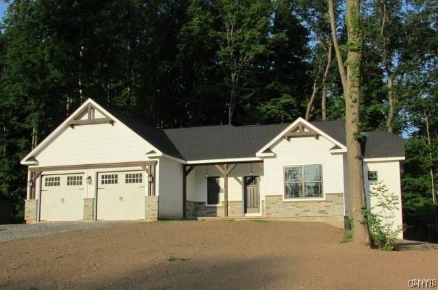 craftsman house featuring a garage