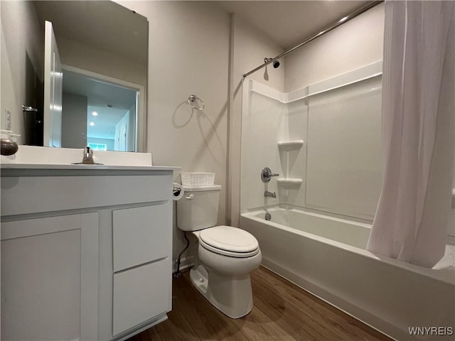 full bathroom with wood-type flooring, vanity, toilet, and shower / bathtub combination with curtain