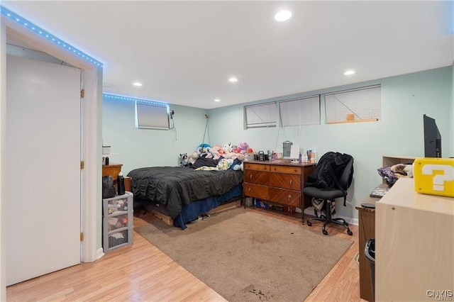 bedroom with light hardwood / wood-style floors