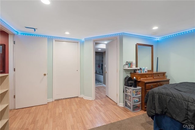 bedroom with light hardwood / wood-style flooring