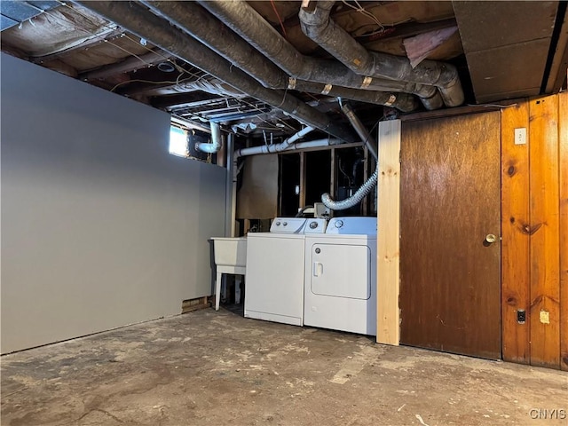 basement featuring separate washer and dryer