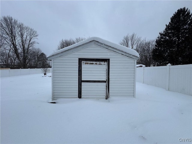 view of snow covered garage