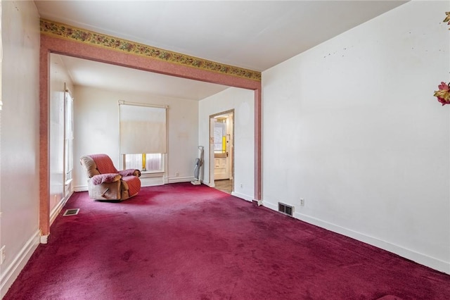 unfurnished room featuring carpet floors