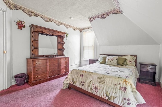 bedroom featuring a textured ceiling, light colored carpet, and vaulted ceiling