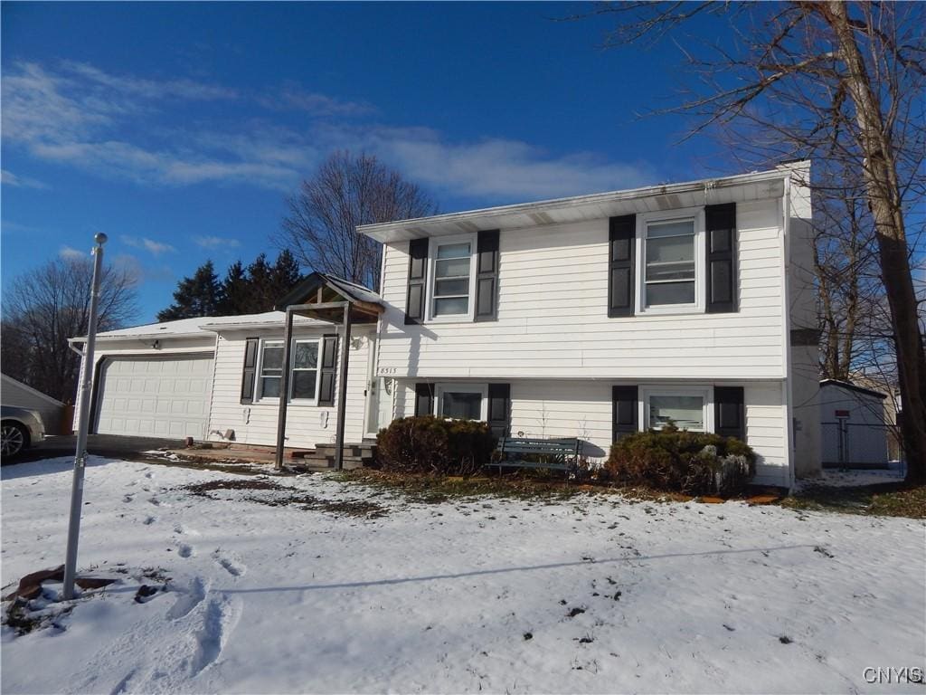 split level home with a garage