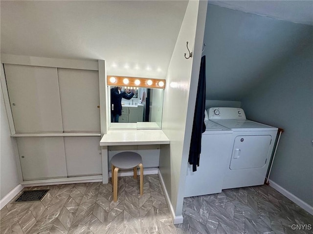 laundry room featuring washer and clothes dryer