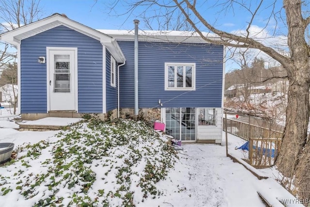 view of snow covered property