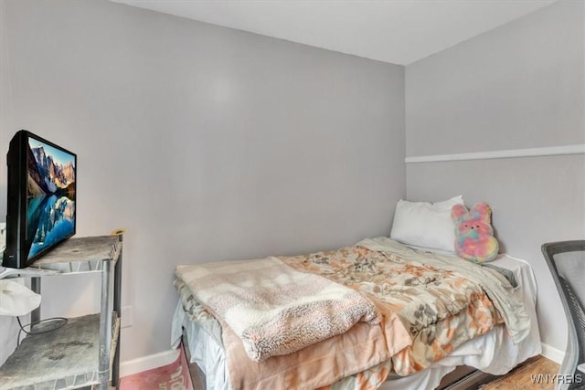 bedroom featuring wood-type flooring