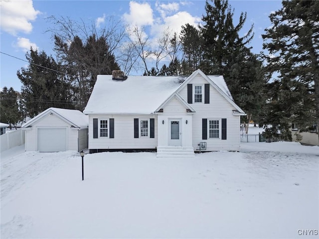 view of front of home featuring an outbuilding and a garage