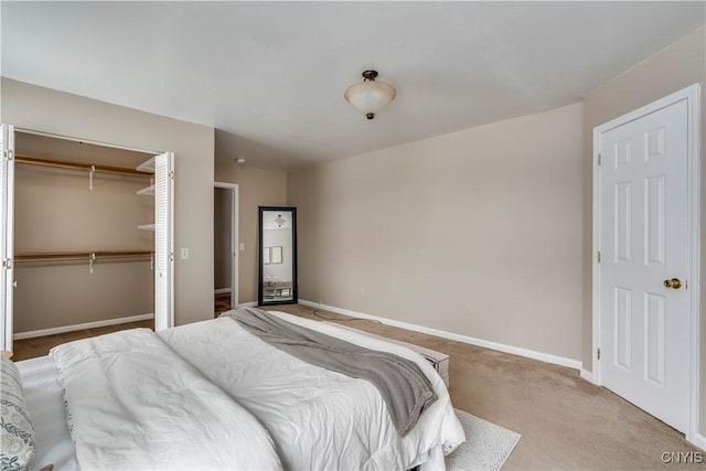 carpeted bedroom featuring a closet