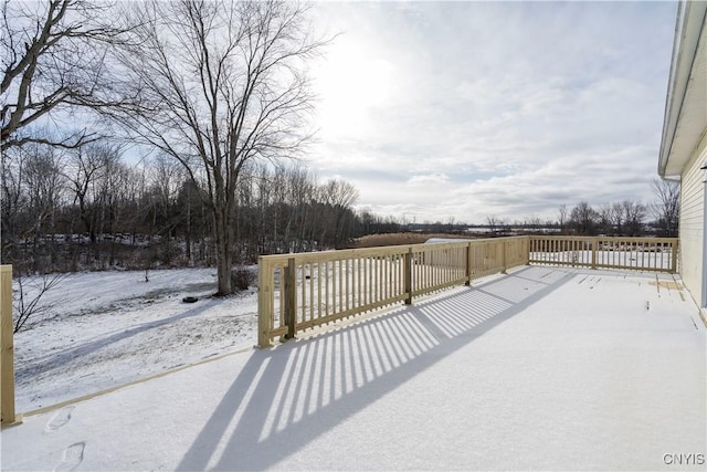 view of snow covered deck