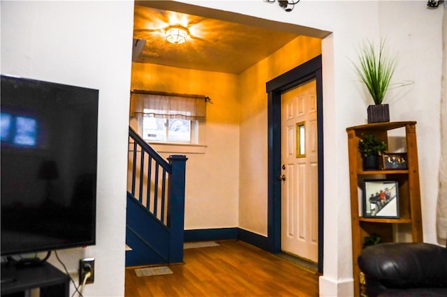 interior space with hardwood / wood-style flooring