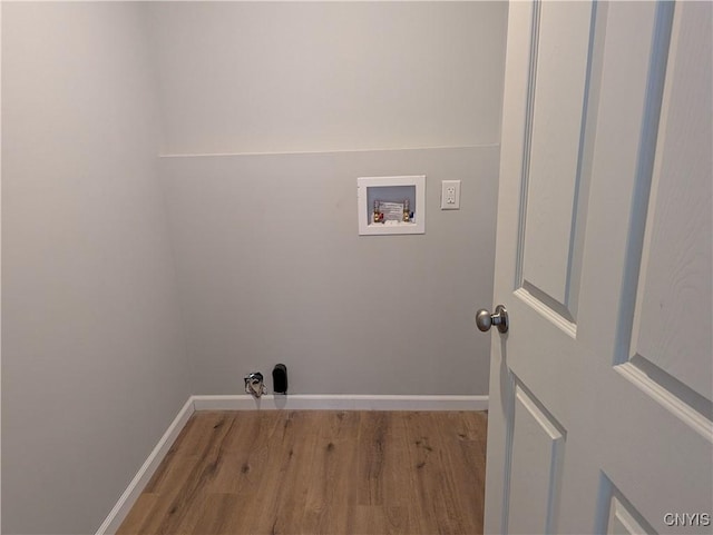 washroom featuring washer hookup and light wood-type flooring