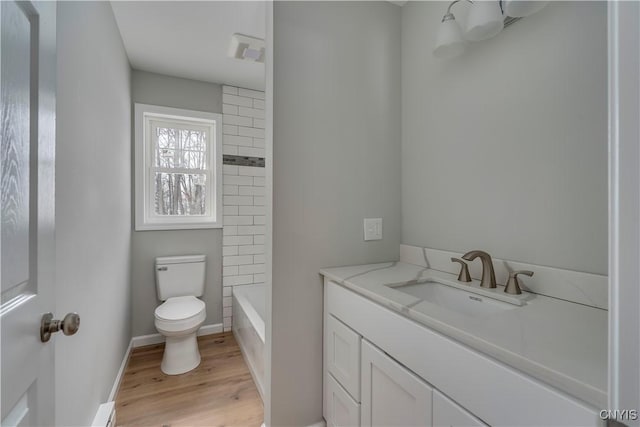 6661 Pine Grove Rd, Watson, NY 13343 - bathroom with vanity, wood finished floors, and bathing tub / shower combination