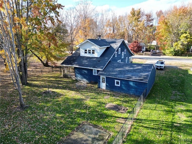 view of home's exterior featuring a lawn