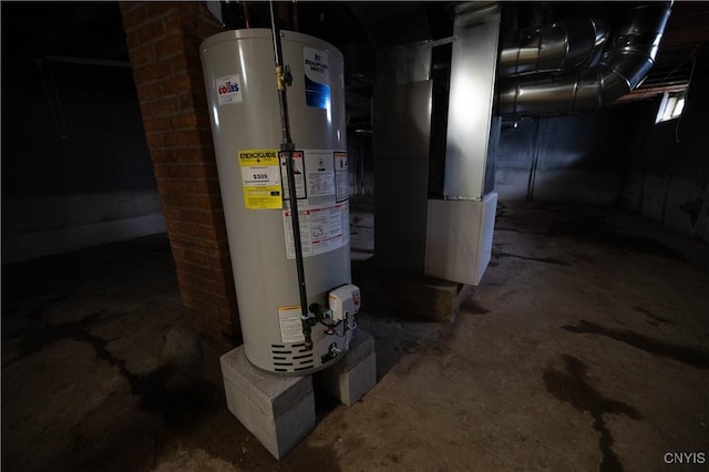 utility room with gas water heater